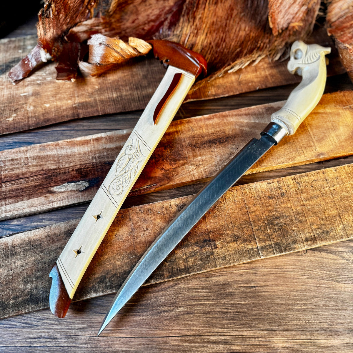 hand-forged Indonesian Laduk knife coffee wood handle traditional carved detail view