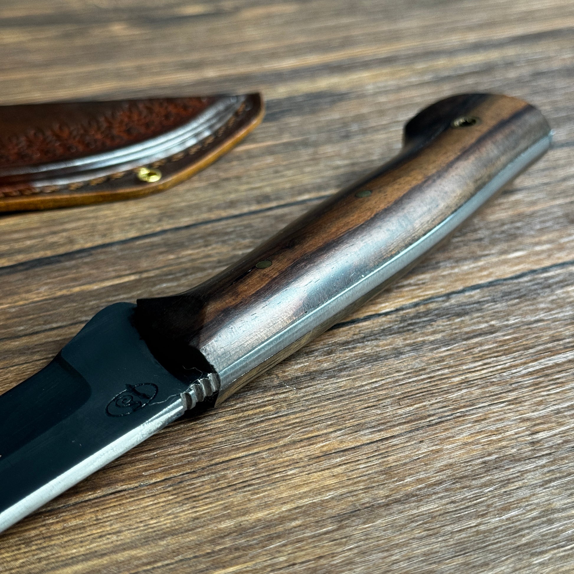 butcher knife butcher knife hand forged spring steel rosewood handle close up detail
