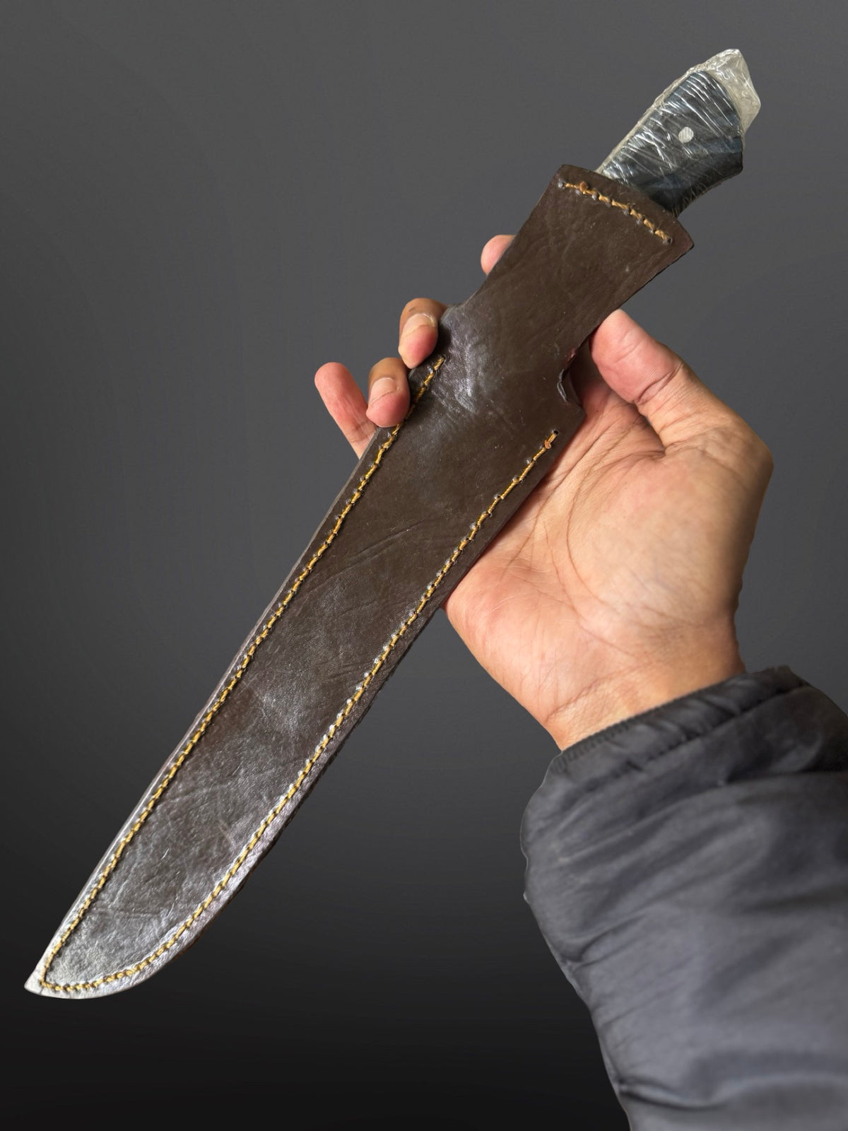 micarta handle hand-forged fillet knife ergonomic grip close-up detail view