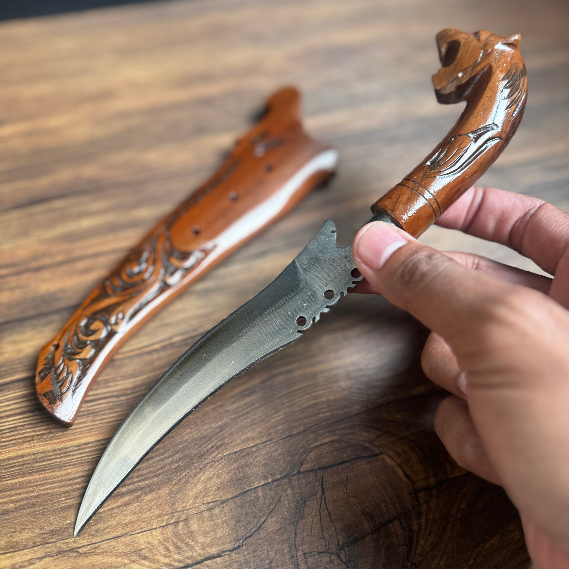 fixed blade knife hand forged steel blade side profile close up