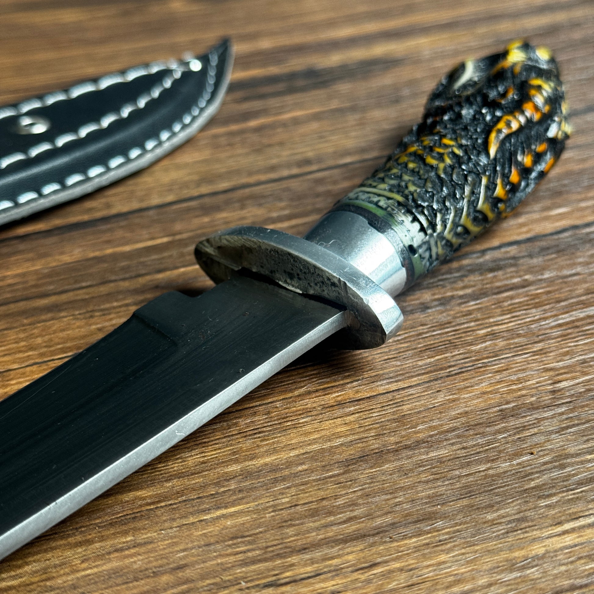 fixed blade knife fixed blade knife hand forged spring steel dragon handle close up detail
