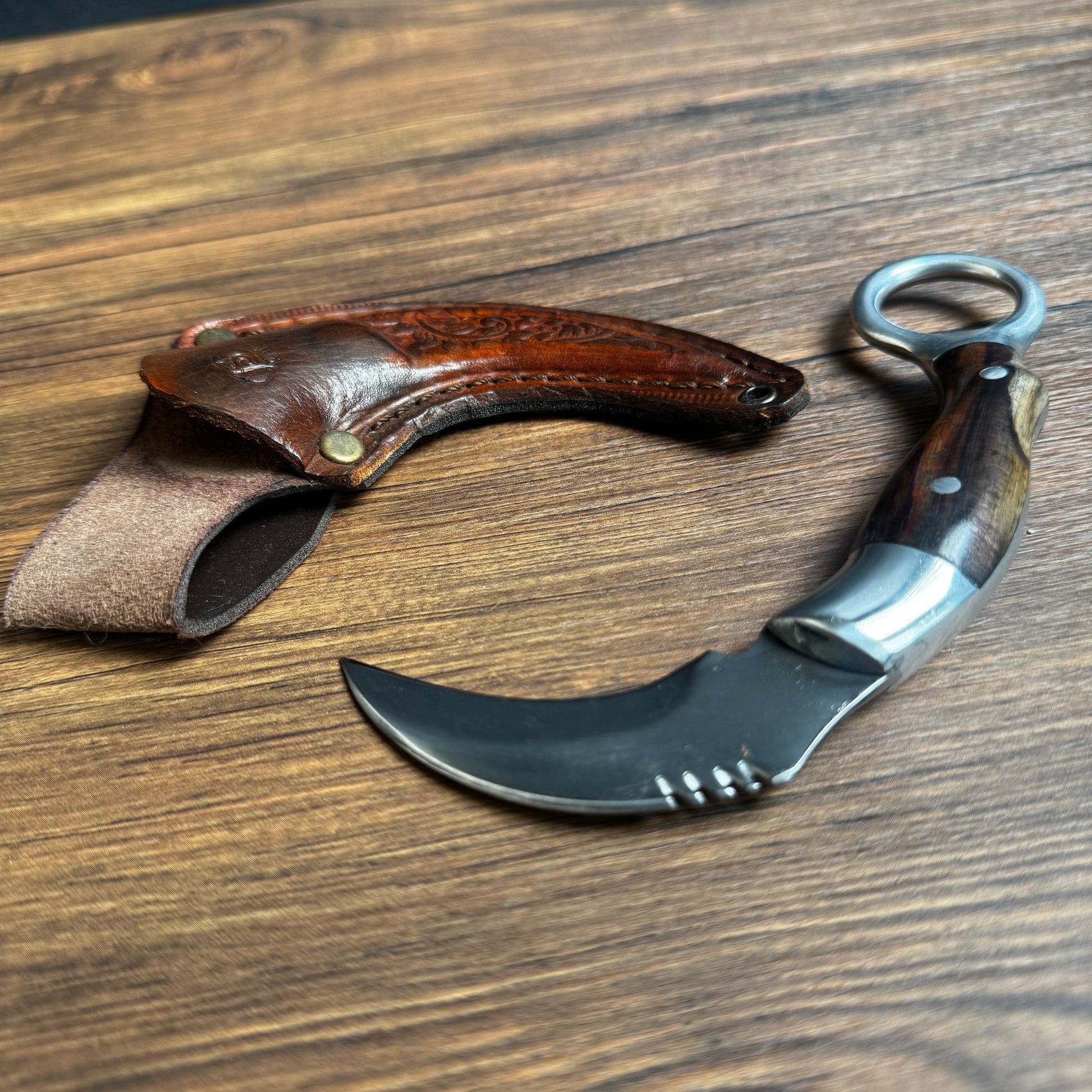 karambit knife spring steel blade side profile close up